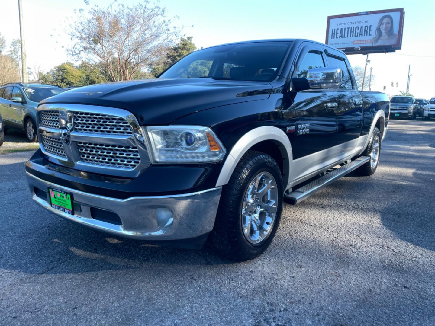 2014 BLACK RAM 1500 LARAMIE (1C6RR6VTXES) with an 5.7L engine, Automatic transmission, located at 5103 Dorchester Rd., Charleston, SC, 29418-5607, (843) 767-1122, 36.245171, -115.228050 - Photo#2